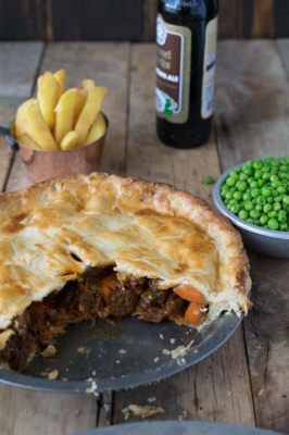  Steak and Ale Pie: Un trionfo di sapori rustici e una crosta dorata da spezzare!